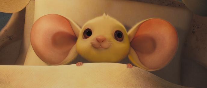 baby despereaux tilling looking up while laying in a cot