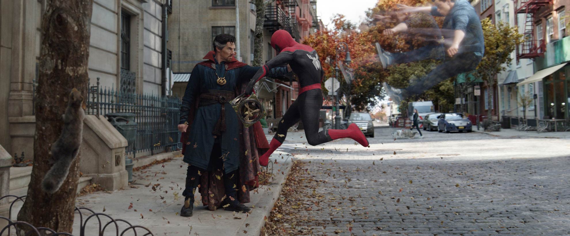 Doctor Strange pushes Spider-Man, showing a digital visual effect of Peter Parker's spirit shooting out behind