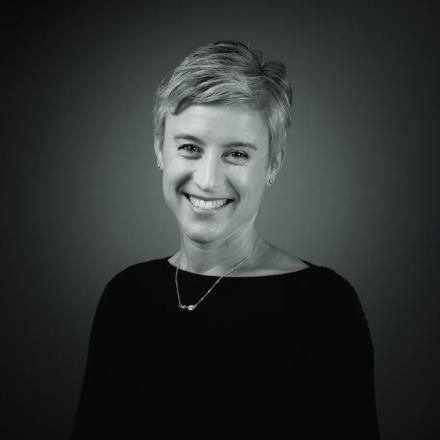 A black and white photo of Lara Hopkins