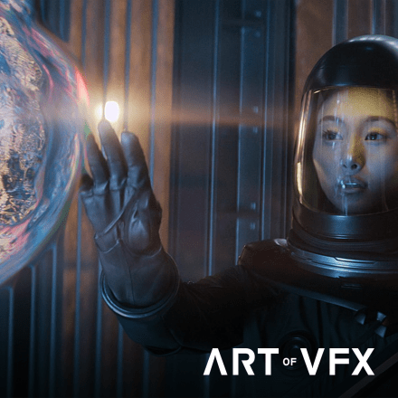 A still from Invasion showing a woman looking at a glowing unformed alien. 