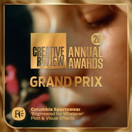 A still from a Columbia Sportswear ad overlaid with a gold border and a gold Creative Review Logo.