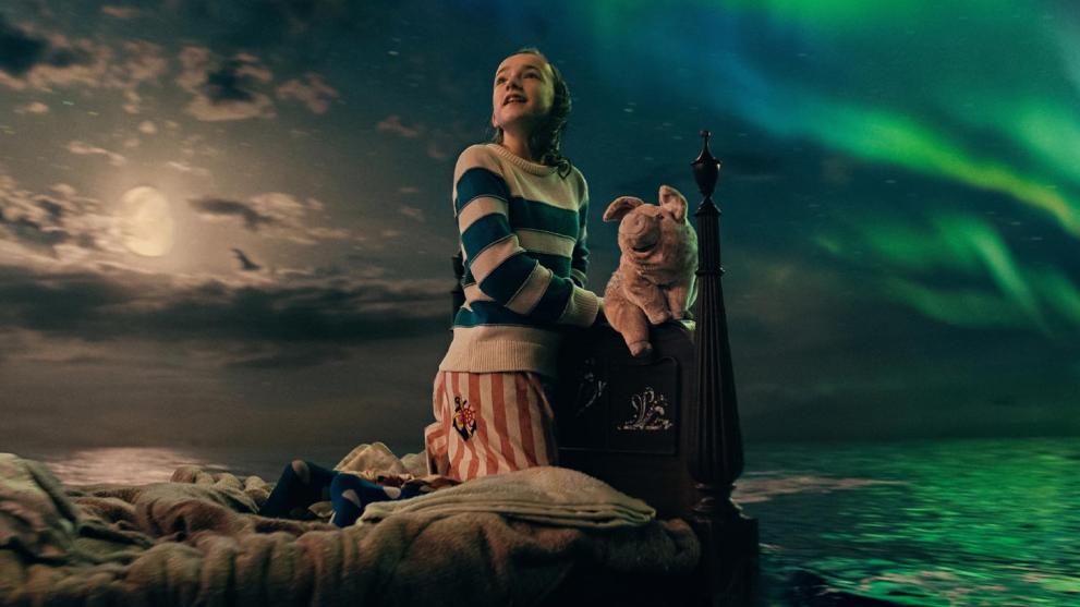 Nemo sits on her bed, with animated cuddly toy Pig, as it floats across a CGI ocean